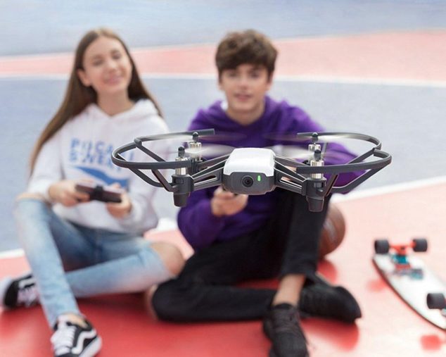 Kids flying a drone for STEM Action Flix