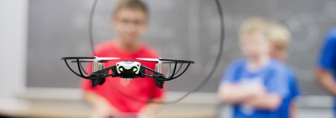 Children with a drone