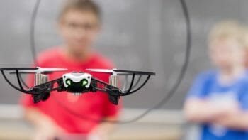 Children with a drone