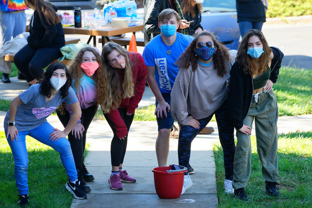 Kids with masks outside