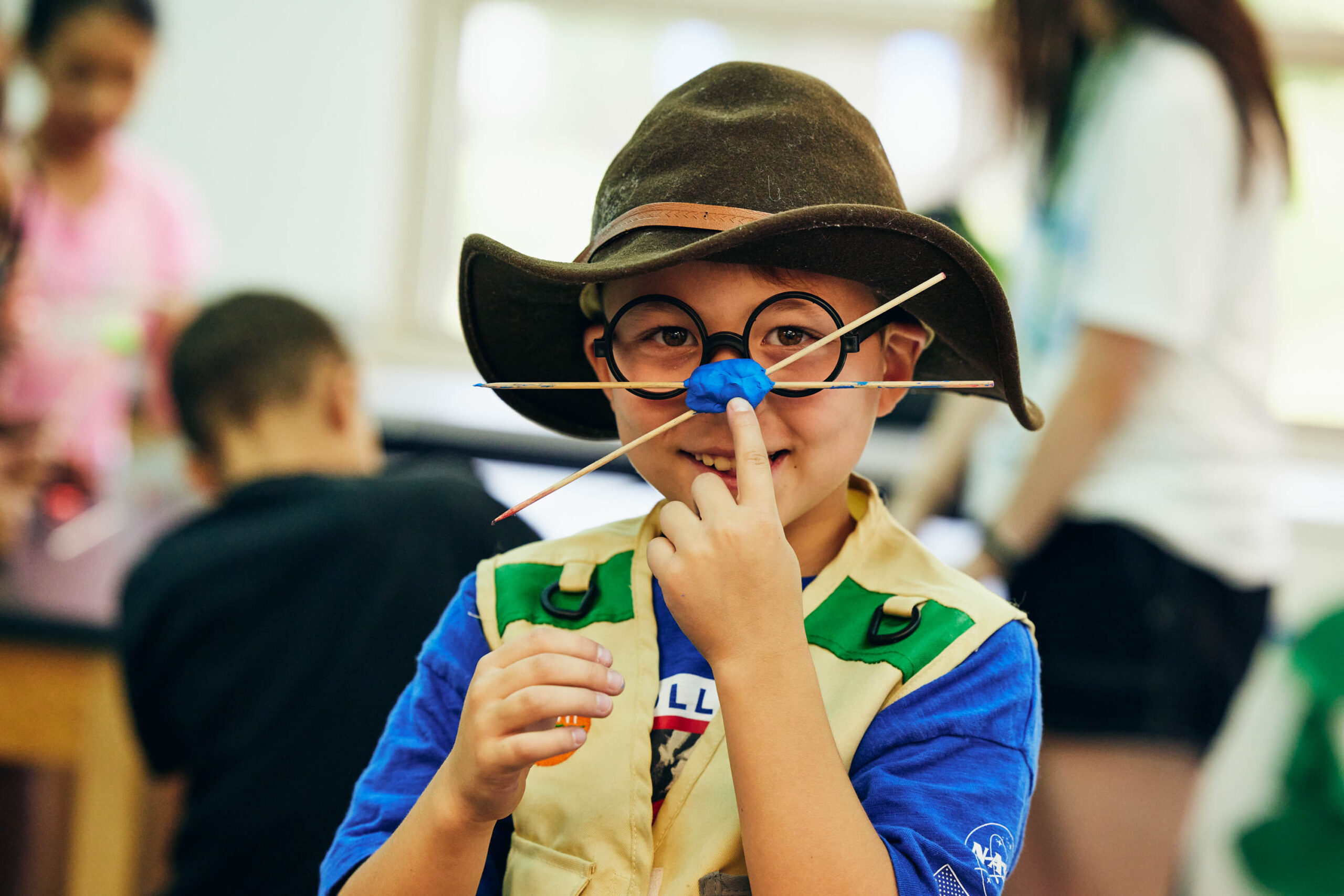 A young student working on arts and crafts.